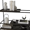 Modern Black Metal Multi Tiered Shelf With Decorative Vases Books And Candle Holder