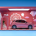 Colorful Display Booth With Pink Car Ferris Wheel Hot Air Balloon Gifts And Checkerboard Floor