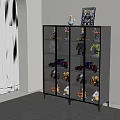 Figure Display Cabinet with Glass Doors Holding Various Action Figures and Decorative Items on Top