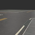 Well Constructed Municipal Road Pavement With Yellow White Lane Markings And Drainage Grates