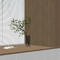 White Venetian Blinds In Modern Interior With Wooden Table Open Book And Plant Vase