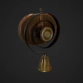 Vintage Wooden Circular Household Item With Decorative Gold Bell And Metal Accents
