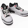 Stylish White Black Red Sneakers With Patterned Upper Red Accents White Laces And Textured Sole