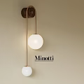 Minotti Modern Wall Lamp With Brass Frame And White Spherical Shades On Beige Wall
