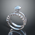 Elegant Diamond Ring With Large Central Stone And Small Accent Diamonds On Silver Band