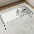 Sleek Glass Coffee Table With Curved Legs On Soft Carpet And Decorative Vase