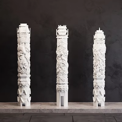 Three Intricately Carved White Stone Pillars With Ornate Designs Against Dark Background 3d model