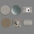 Assorted Cushions In Various Shapes With Woven And Fabric Textures In Neutral Tones