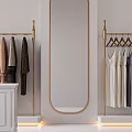 Elegant Clothing Store With White Walls Golden Racks Mannequin Brown Sofa And Purple Flowers