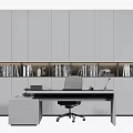 Modern Office Desk With White Cabinets Books And Decorative Items