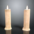 Two Lit Beige Textured Candle Lamps On Black Surface With Gray Background