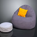 Gray Bean Bag Chair with Yellow Pillow and White Small Round Stool in Living Room
