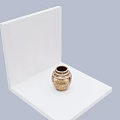 Rustic Ceramic Jar With Brownish Mottled Texture And Woven Rope Decorations On Neck