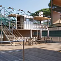Modern Outdoor Lounge Area With Wooden Deck And Seating Furniture Structure
