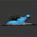 Blue Hippo Sculpture With Small Plant On Sandy Ground Decorative Artwork