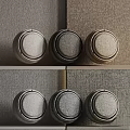 Three Circular Decorative Components Mounted on Textured Wall Surface Design 3d model