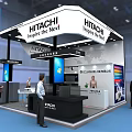 Hitachi Exhibition Booth With Modern Design Digital Screens Lighting And Visitors
