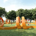 Orange Circular Art Installation On Green Lawn Surrounded by Trees With People Around