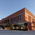 Modern Red Brick Sales Office Building With Large Glass Windows And Front Plaza