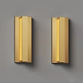 Pair of Golden Modern Wall Lamps with Sleek Metal Design on Grey Wall