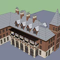 Historic Red Brick Building With Spire Tower Chimneys Arched Windows And Porch