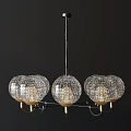 Elegant Modern Chandelier Design With Crystal Globe Shades And Gold Hanging Elements