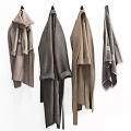 Soft Hanging Towels in Neutral Brown Gray Beige Tones on White Background