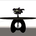 Round Marble Top Dining Table With Unique Metal Base And Purple Flower Vase