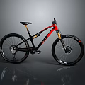 Red And Black Mountain Bike With Large Tires And Suspension System