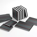 Electronic Appliances Black Gray Sheets in Various Sizes Stacked and Scattered