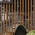 Warm Wooden Restaurant Interior With Dining Tables Chairs Bar Counter And Large Windows