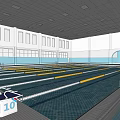 Indoor Swimming Pool With Yellow Lanes Starting Blocks And Large Windows