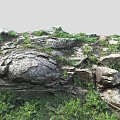 Natural Scenic Landscape Featuring Moss Covered Rocks And Lush Green Grass