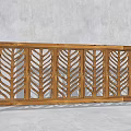 Wooden Garden Fence Ornament With Leaf Shaped Cutouts Against Light Wall And Tree Leaf Shadows
