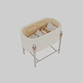 Beige Soft Padded Baby Crib With Sturdy Wooden Legs And Decorative Pillows