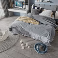 Cozy Kids Bed In Bedroom With Gray Bedding Desk Nightstand Toys And Rug