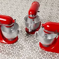 Red Stand Mixers As Modern Kitchen Appliances With Stainless Steel Bowls