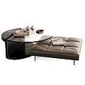 Modern Coffee Table With Glass Top And Leather Ottoman Featuring Magazines And Decorative Items