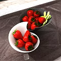 Fresh Ripe Strawberries In White And Dark Bowls With Green Mint Leaves On Dark Tablecloth