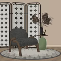 Gray Accent Chair With Black White Geometric Screen Green Vase Side Table And Wooden Floor