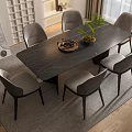 Contemporary Dining Table Set With Black Marble Top Six Gray Fabric Chairs And Green Plant