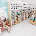 Vibrant Toy Store Interior With Plush Stuffed Animals Display Shelves And Shopping Families