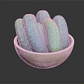Fresh green cucumbers placed in a wooden bowl on dark surface