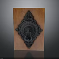 Black Metal Door Knocker With Lion Head Design On Wooden Background And Intricate Carvings
