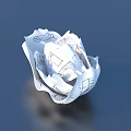 Two Metal Mesh Trash Cans With Crumpled Paper One Tipped Over On Light Blue Surface