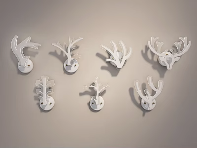White Antler Shaped Wall Lamps with Multiple Sizes Mounted on Beige Wall Modern Home Decor 3d model