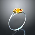 Elegant Silver Ring Featuring Gold Flower Shaped Design And Orange Gemstone