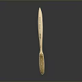 Wooden Brush With Yellow Bristles And Engraved Handle On Dark Background