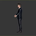 Man in dark blue suit white shirt red shoes with arms outstretched against gray background