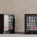 Two Black Glass Door Beverage Refrigerators With Colorful Canned Drinks In Modern Home